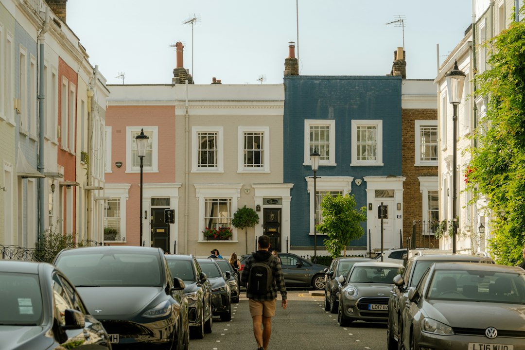 A colourful row of terraced houses on a London street on a sunny day | Photo: Unsplash