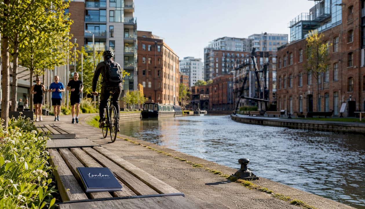 Limehouse Cut canal with historic warehouses and towpath