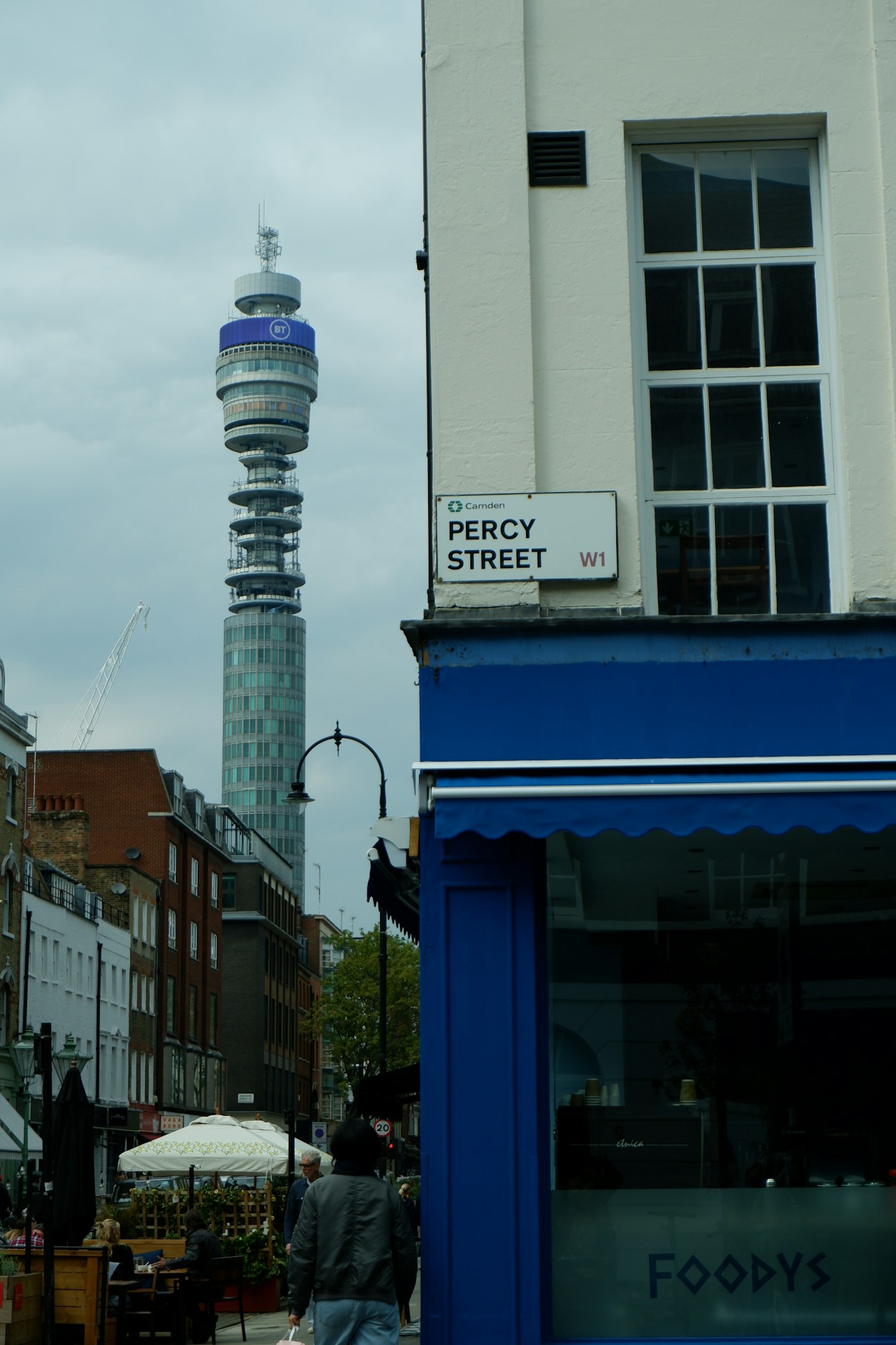 Charlotte Street Fitzrovia London with restaurants and the BT Tower in the background