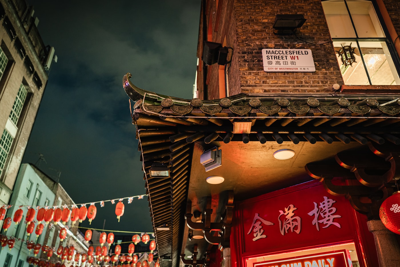 Carnaby Street and neon signs at night in Soho, Central London